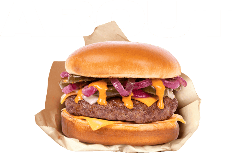 A hand holding a double patty cheese burger A hand holding a double patty cheese burger